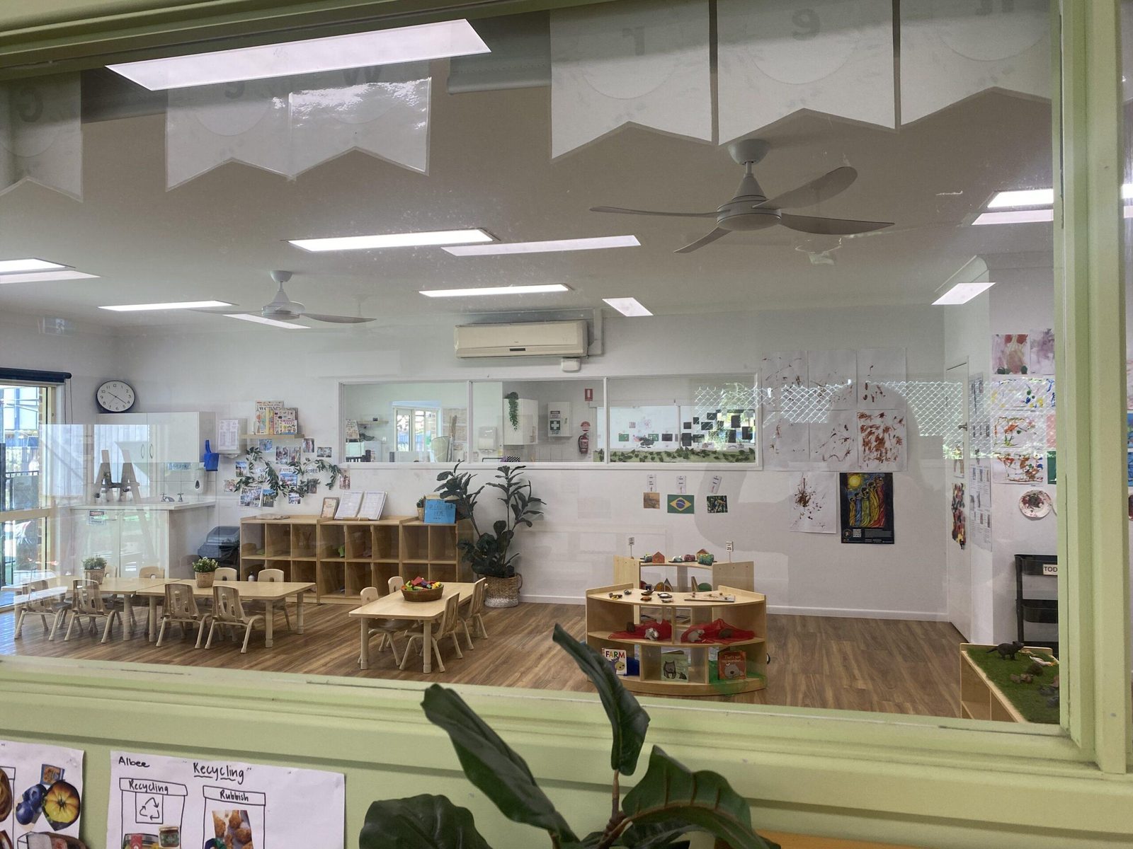 Light filled learning room with timber furniture
