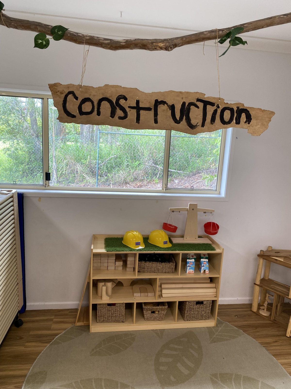 Construction corner with timber blocks and shelving