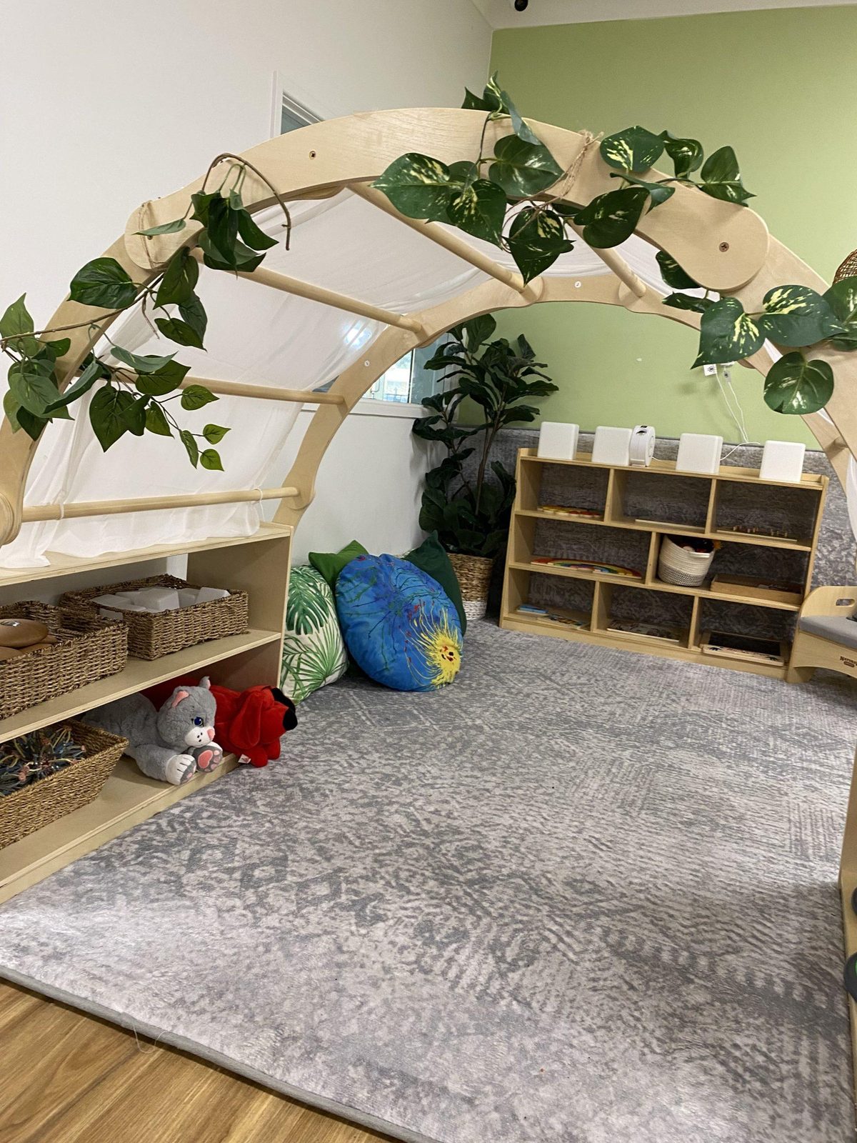 Soft reading nook framed with greenery