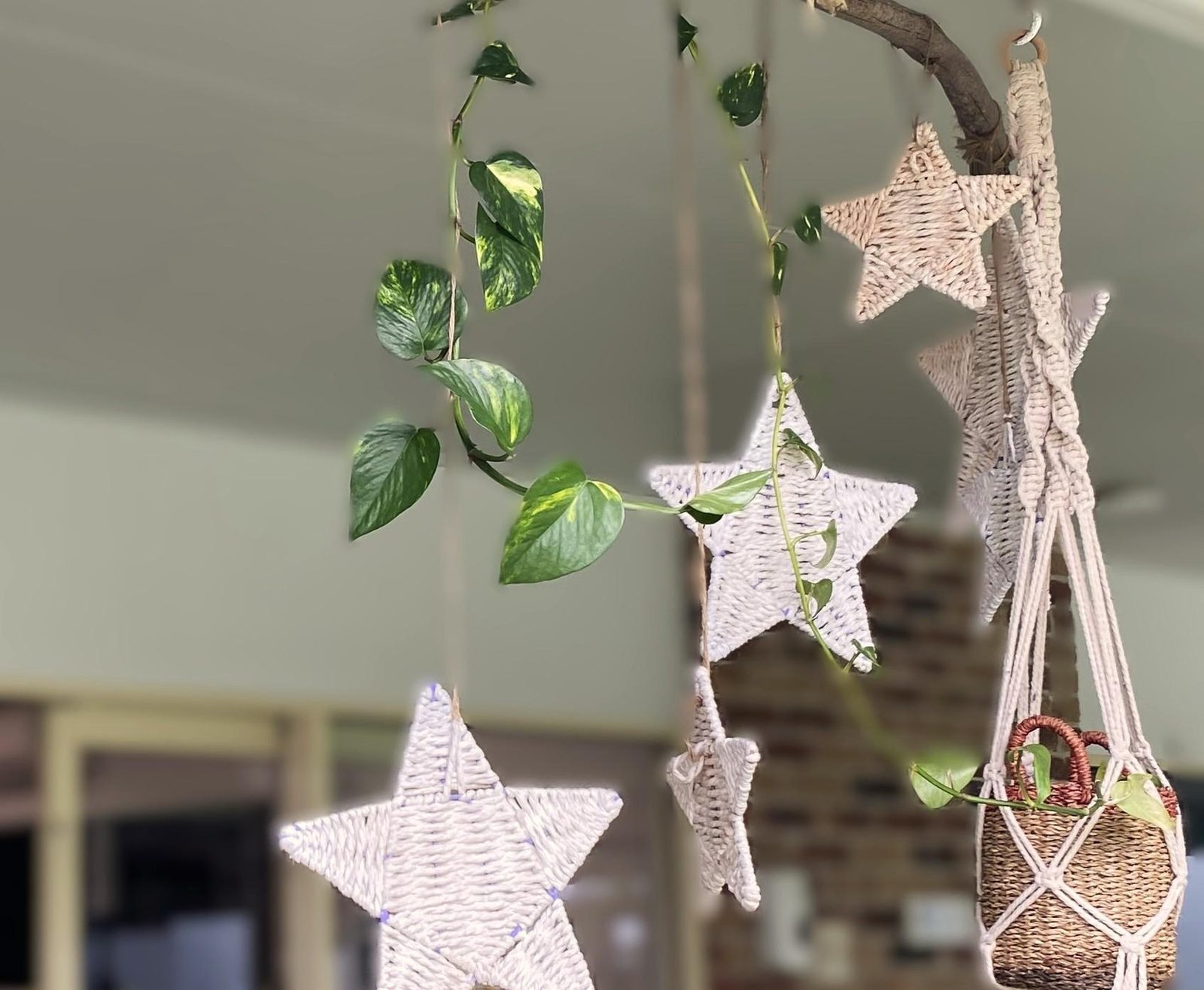 Hand made star mobile hanging above the room